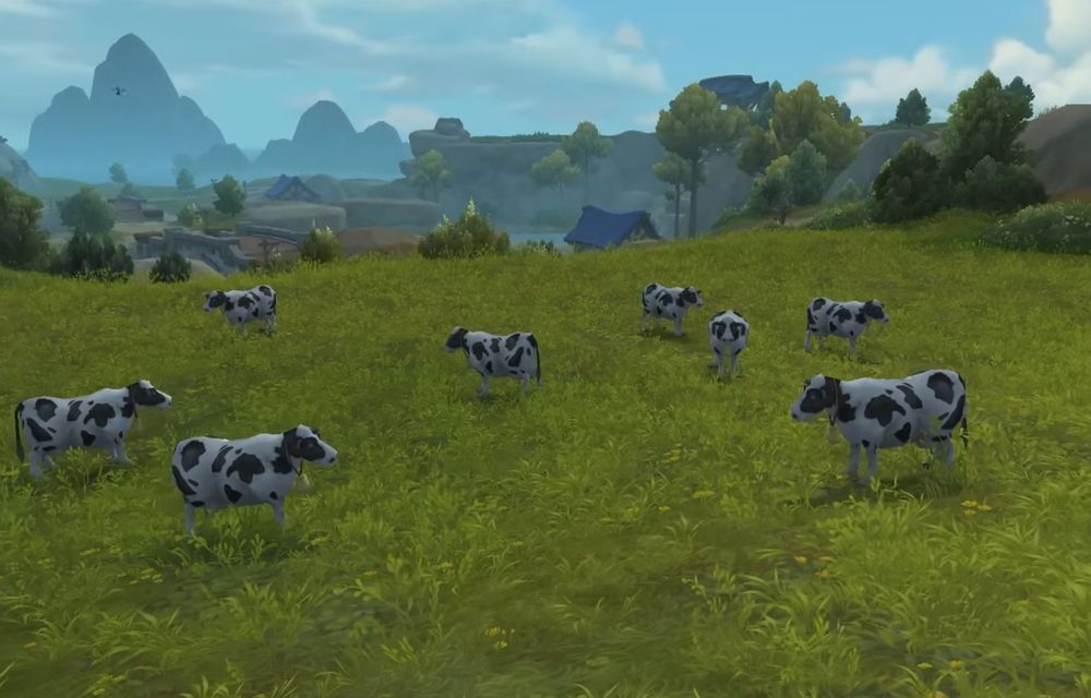 A view of a field of black and white cows with small rocky outcrops in the distance in Founders Point, Alliance Player Housing zone.