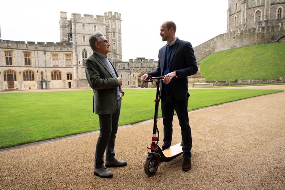 Eugene Levy & Prince William on a scooter for a tv show