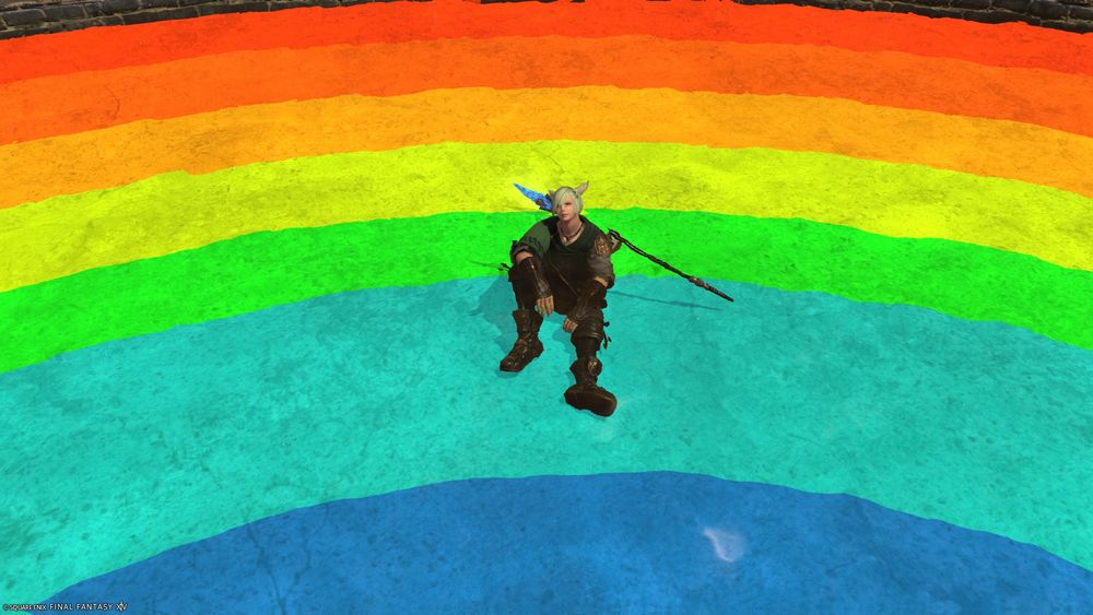 A screenshot of Green sitting in a pool with rainbow stripes beneath him.