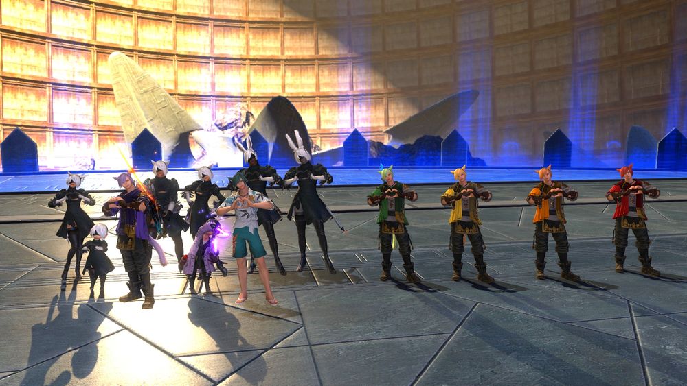 A screenshot of the Grainbow posing with a group dressed as 2B in the Puppets' Bunker.