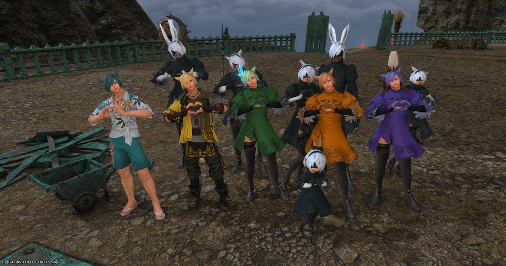 A screenshot of several of the Grainbow posing with the 2B group, this time in Tomra. Green, Orange, and Purple are also wearing 2B outfits.