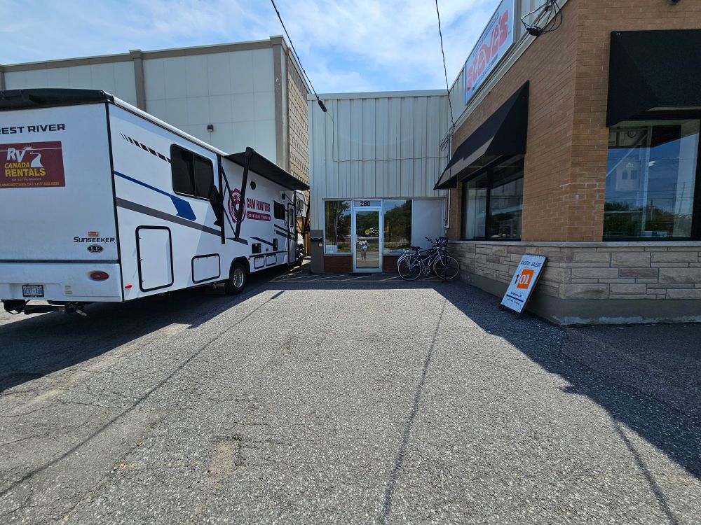 RV  parked in front of the building of Gallery 101 in Ottawa