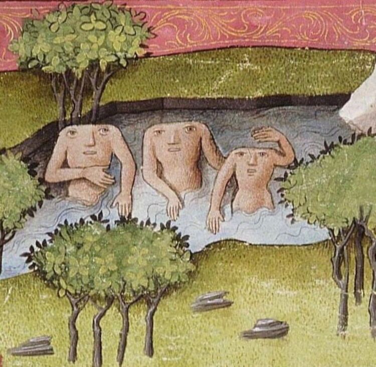 A medieval drawing of three beings that resemble naked headless men with faces on their chests, standing in a pond surrounded by grass and trees