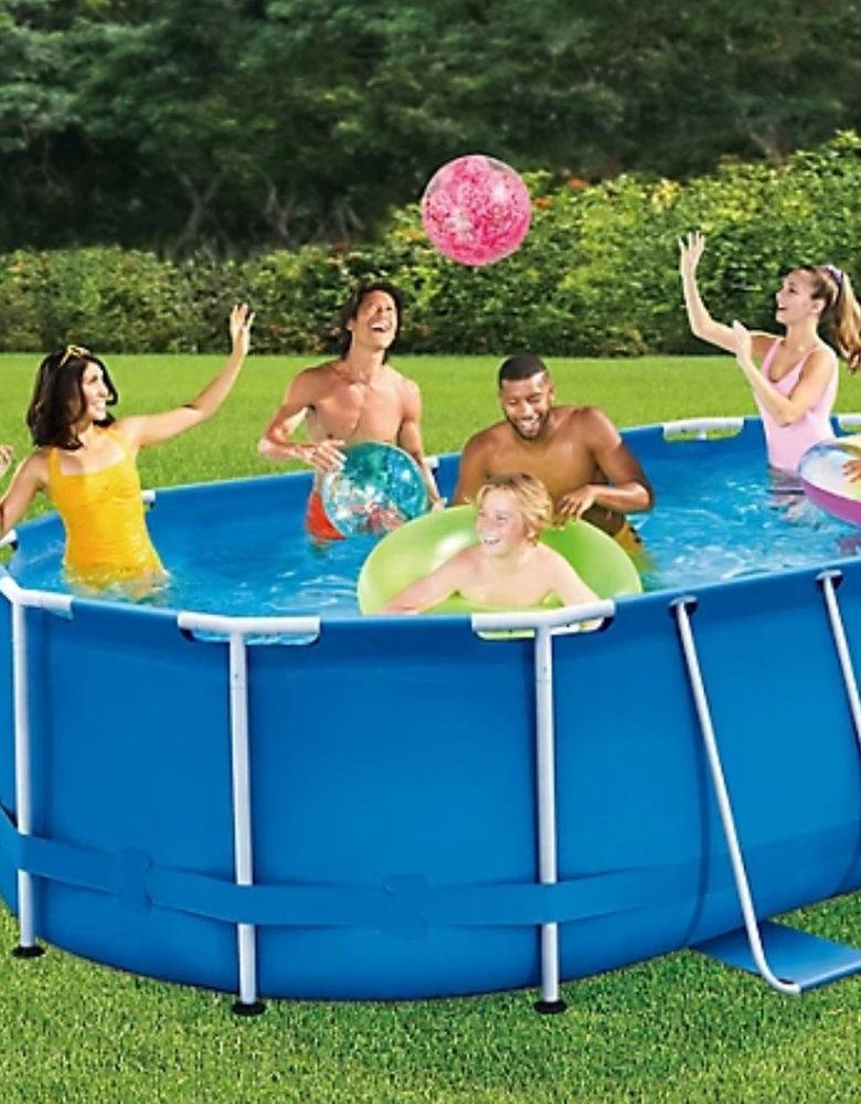 A poorly photoshopped image of an above ground pool with fake ass people inside of it having more fun than is legally allowed in such a shitty pool. The pool image has been dropped into a random photo of a lawn, and they didn't even bother trying to emulate a shadow on the lawn.