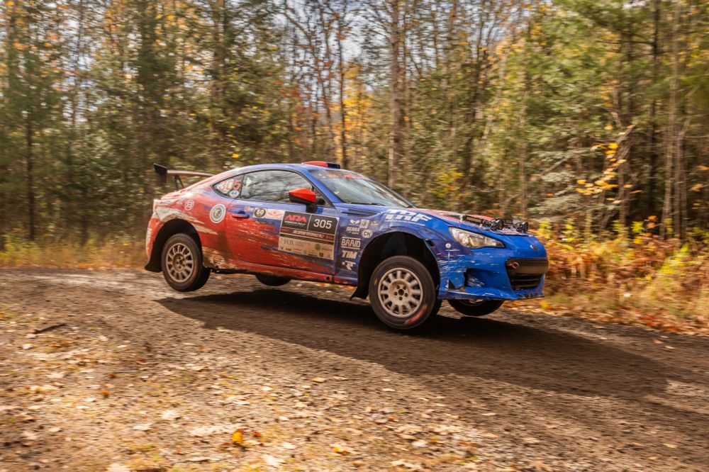 Subaru BRZ rally car in the air after a jump