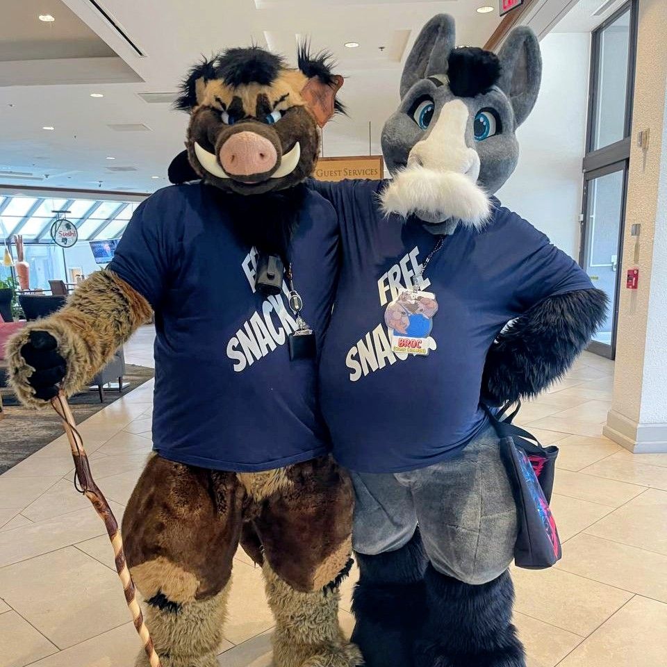 Rasher boar and Broc (cigar stallion) fursuits