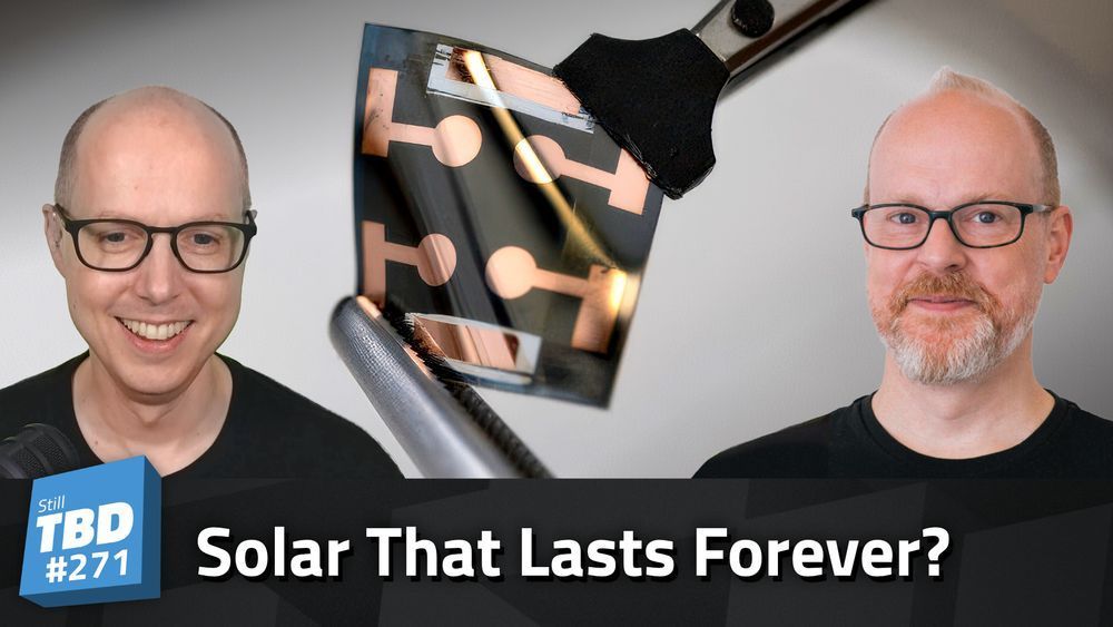 Matt and Sean Ferrell in front of a self-healing solar cell