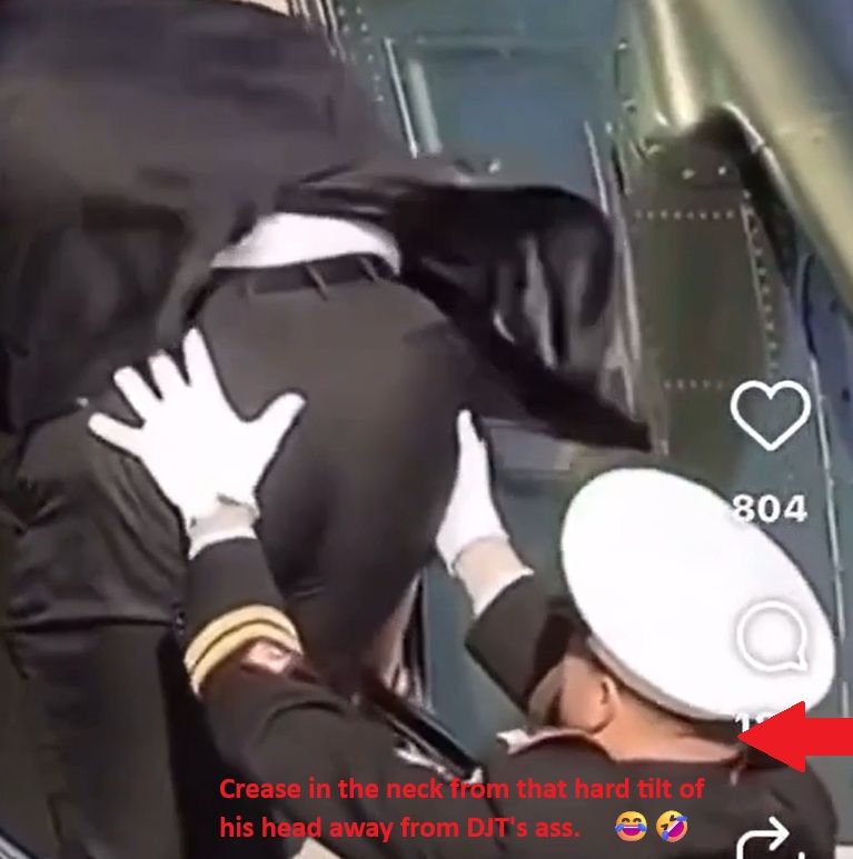 Donald Trumps ass being supported and the guy doing it holding his head back with words pointing out guy has a crease in his neck in trying to keep his face away.