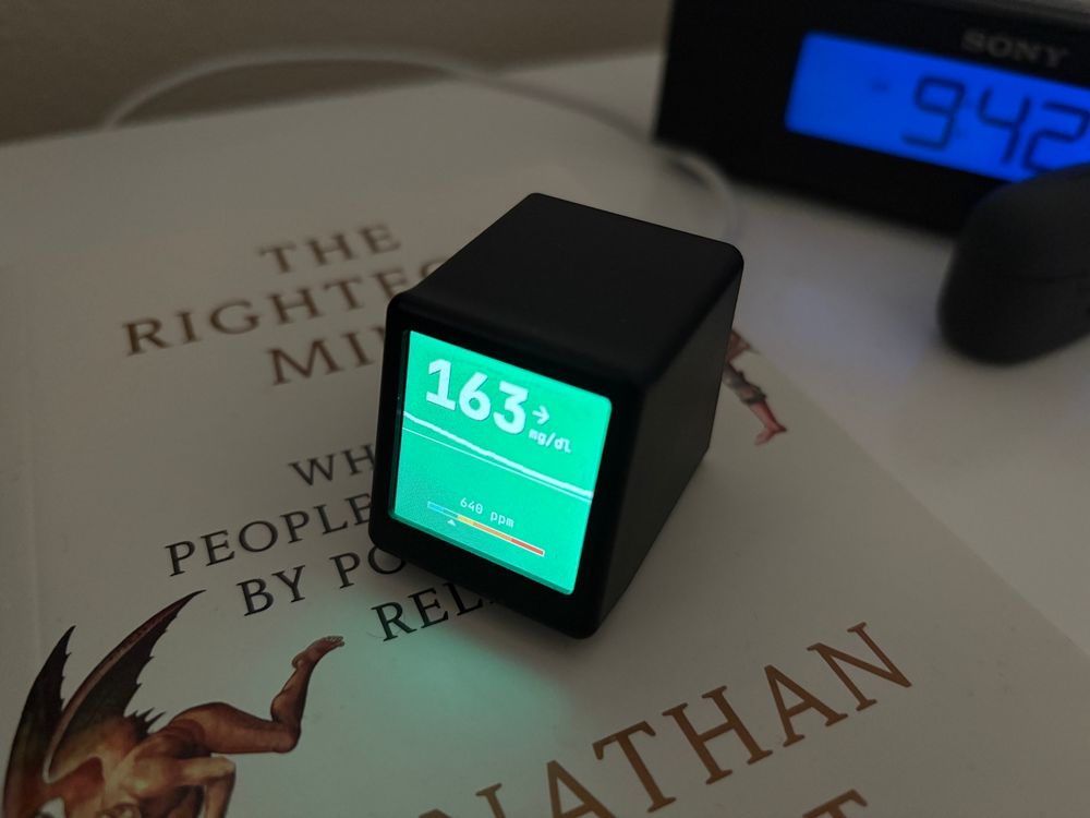 Finished product sitting on my nightstand. Displaying a nicely designed glucose reading, glucose chart and an air quality gauge