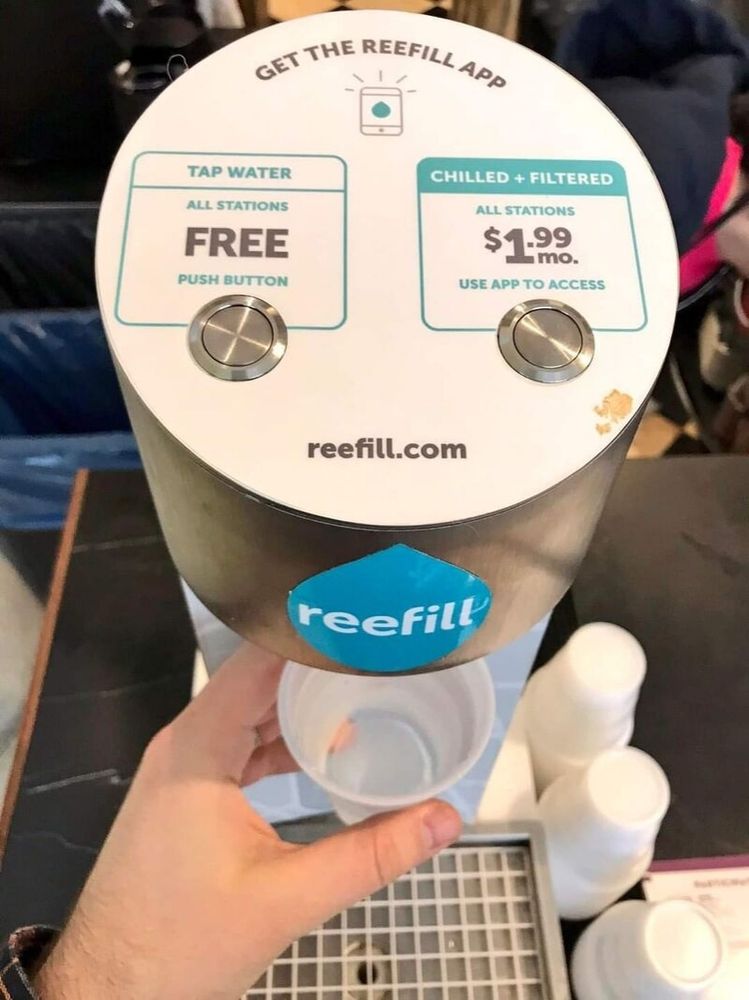 A water fountain that has a free tap water option and a chilled filtered option that requires a $2 monthly subscription in their app