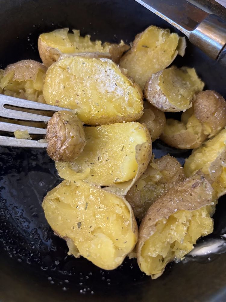 German yellow potatoes cooked and cut up into chunks with butter and herbed salt