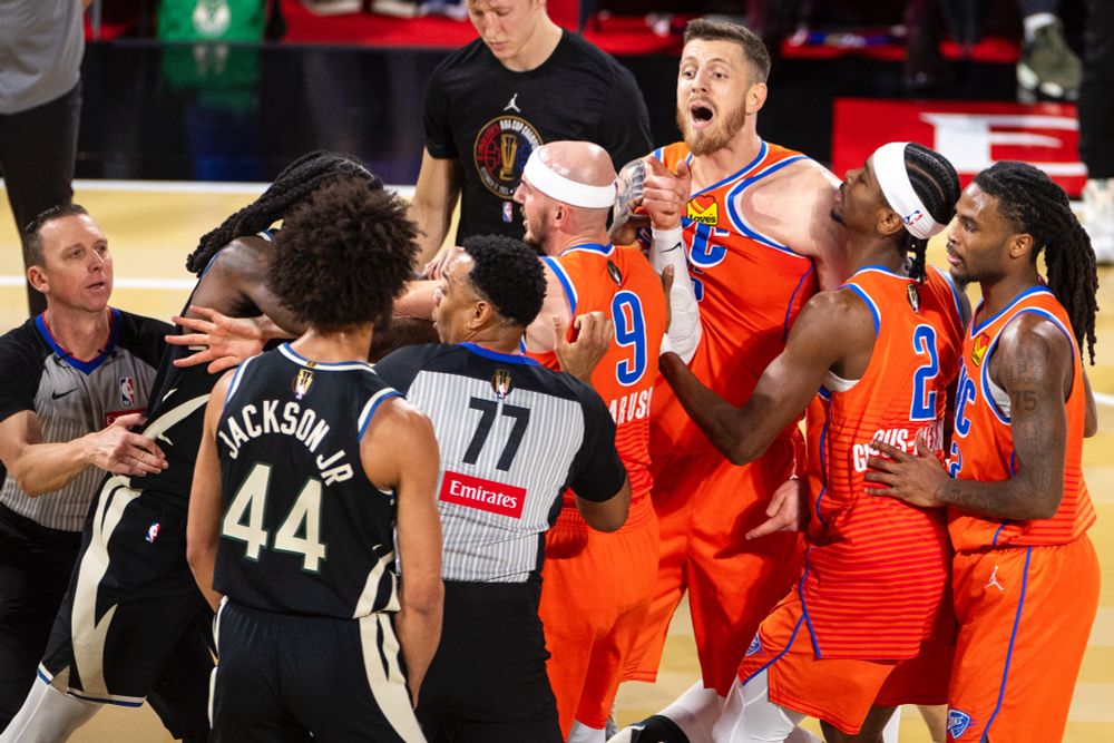 Milwaukee Bucks guard Andre Jackson Jr. (44) and Oklahoma City Thunder center Isaiah Hartenstein, top right, are separated after shoving each other. Both players would eventually receive technical 1 fouls.