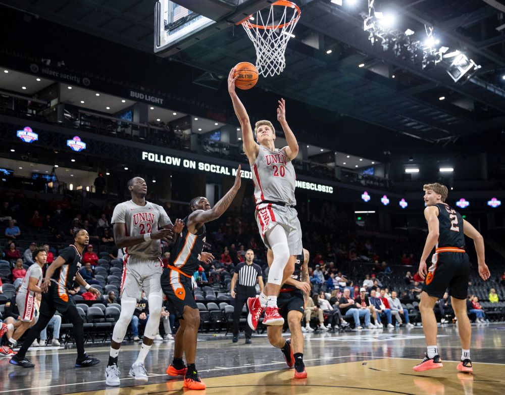 UNLV guard Julian Rishwain (20) attempts a layup.