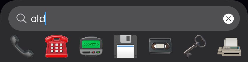 Emoji: a black telephone recorder, a red touch-tone telephone, a pager, a 3.5” floppy disk, a VHS cassette, an old-timey iron key, and a fax machine