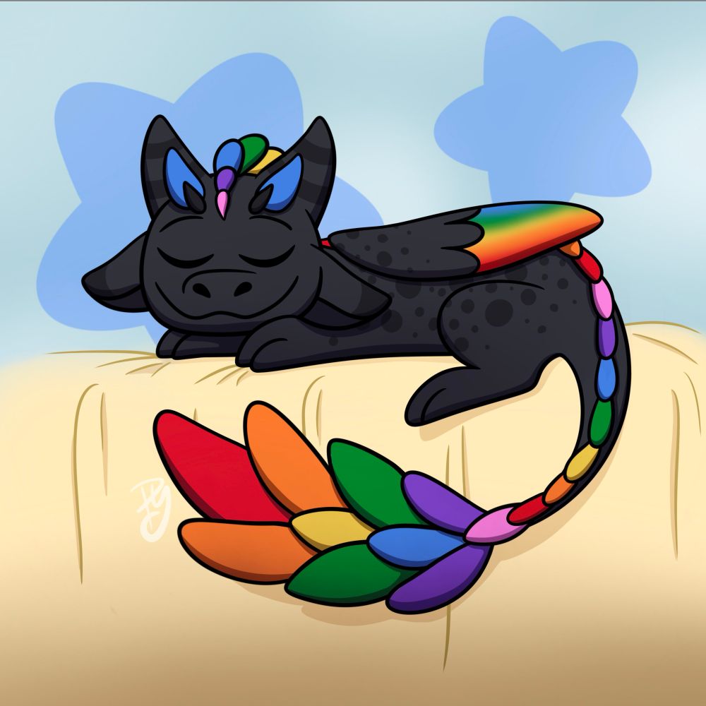 Feathered rainbow dragon (Zen from dragons and beasties) laying on top of a yellow blanket sleeping