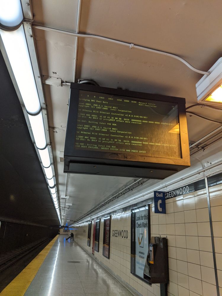 Crashed subway information sign