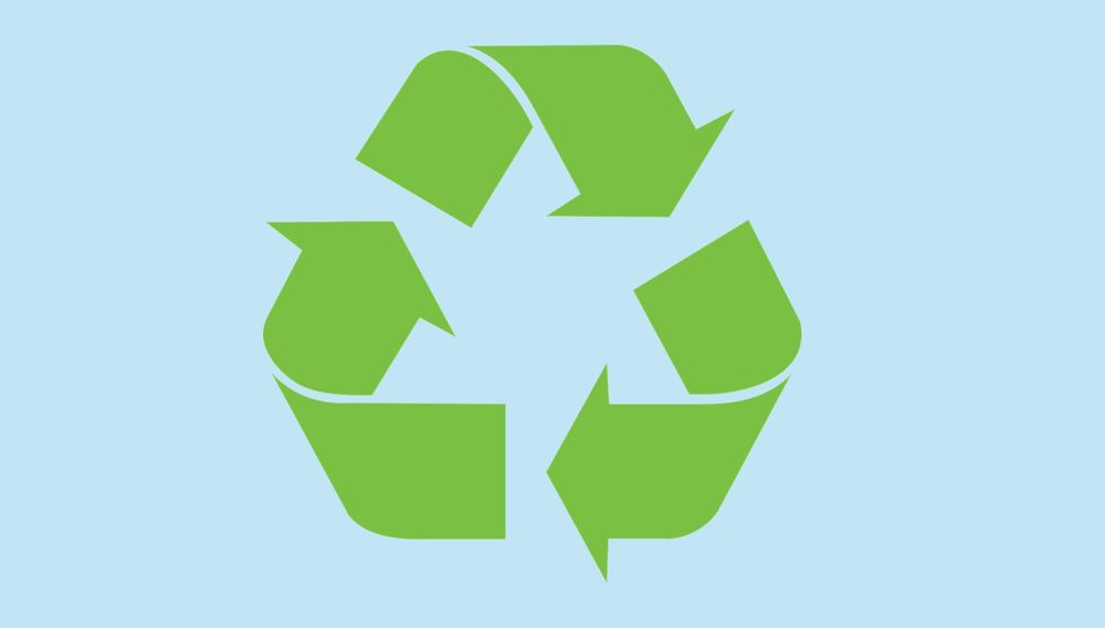 A green recycling symbol on a blue background.