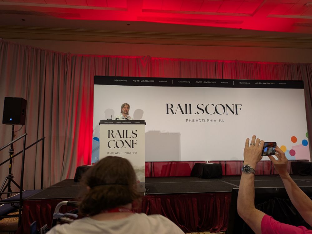 Aaron Patterson on stage at RailsConf