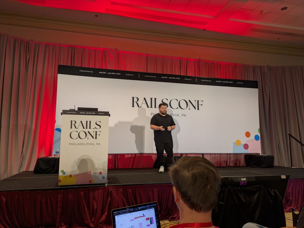 Marco Roth on stage at RailsConf 