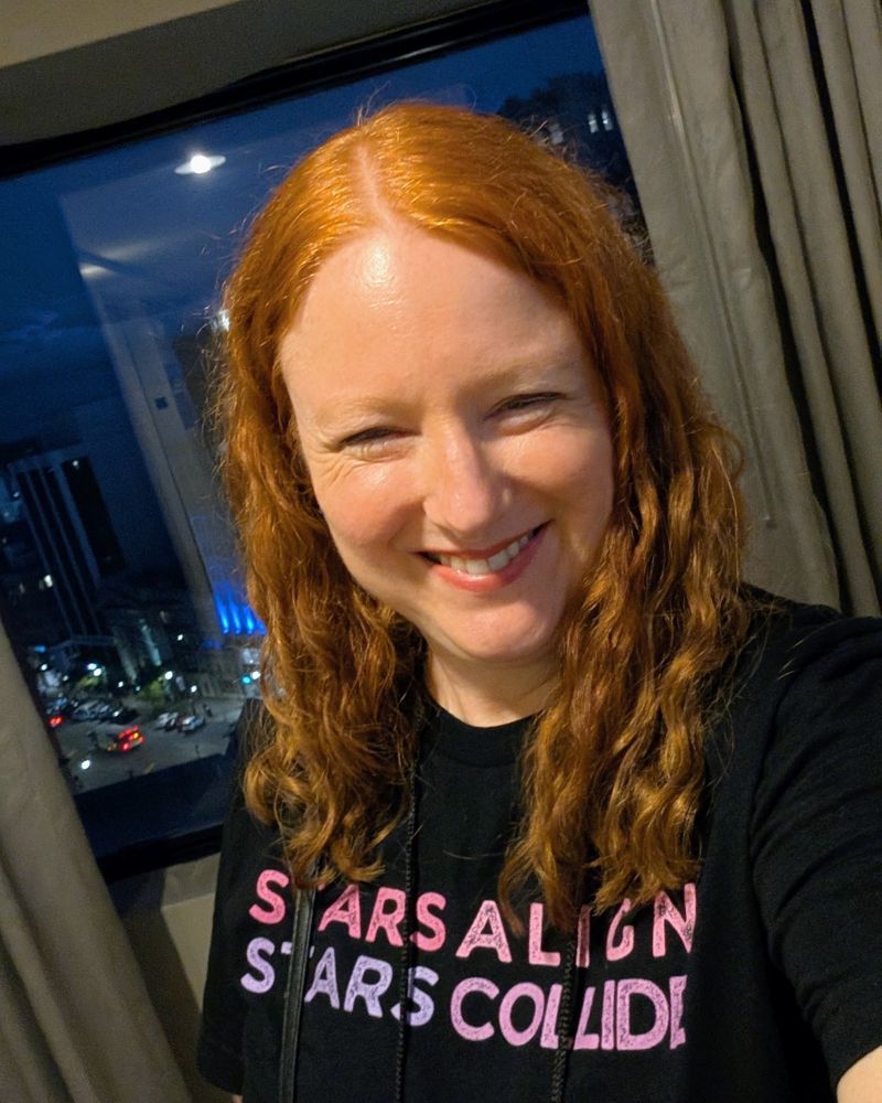 Me in a t-shirt that says Stars Align, Stars Collide