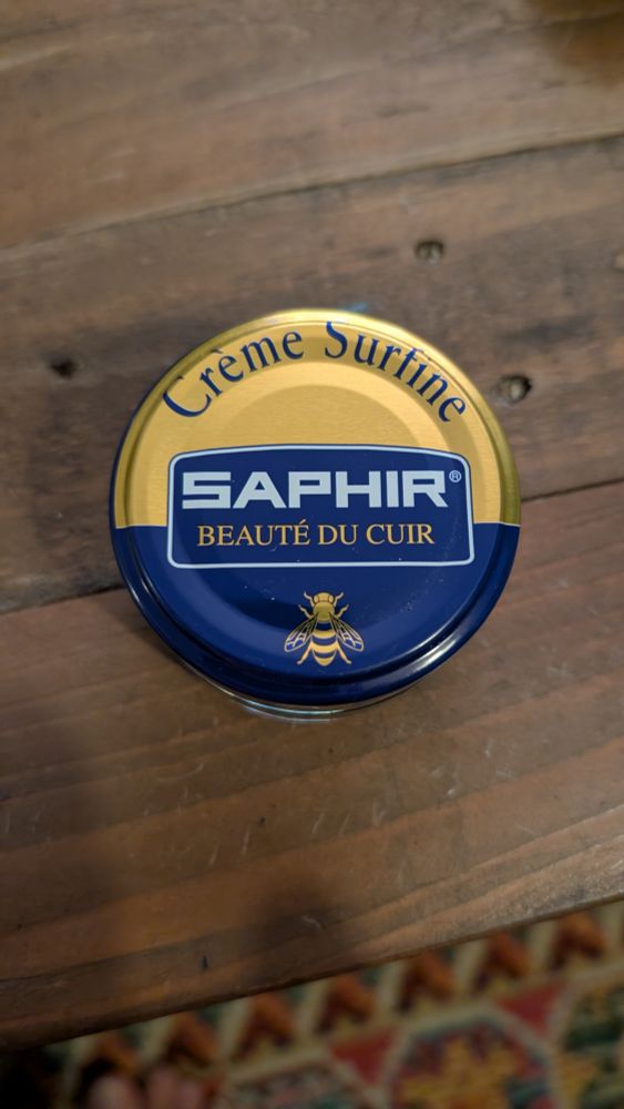Saphir shoe polish on a table 