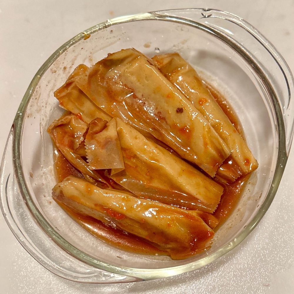 Now freed from their canned confines, the tamales seek warmth. Next stop: the microwave.