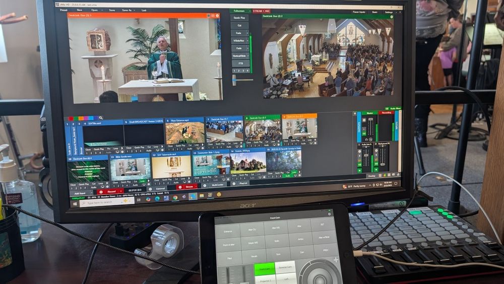Photo of computer screen display Livestream of Sunday Mass