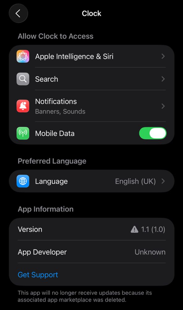 Text in settings for Clock.app on iOS 26: "This app will no longer receive updates because its associated app marketplace was deleted."