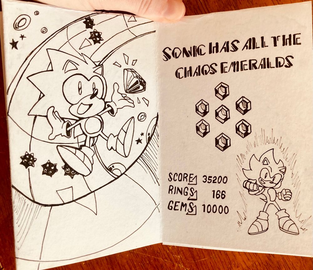 The second interior. On the first page, classic Sonic obtains a chaos Emerald from a Special Stage. The second page is styled like a Special Stage victory screen. Text reads “Sonic has all the Chaos Emeralds.” Beneath the Emeralds, Super Sonic poses next to a list of scores. 