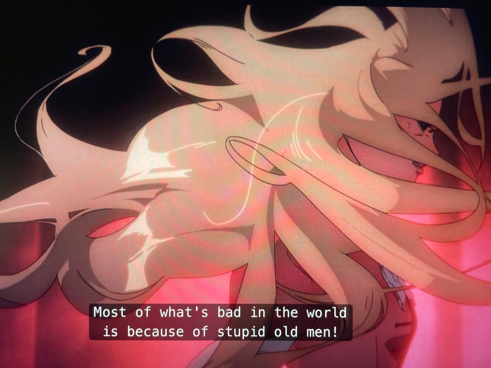 Maria, angry, her long hair flying around her

She’s saying « most of what’s bad in the world is because of stupid old men! »