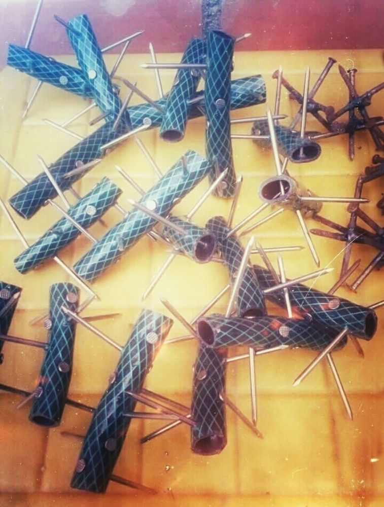 Nails in cut water hose. 