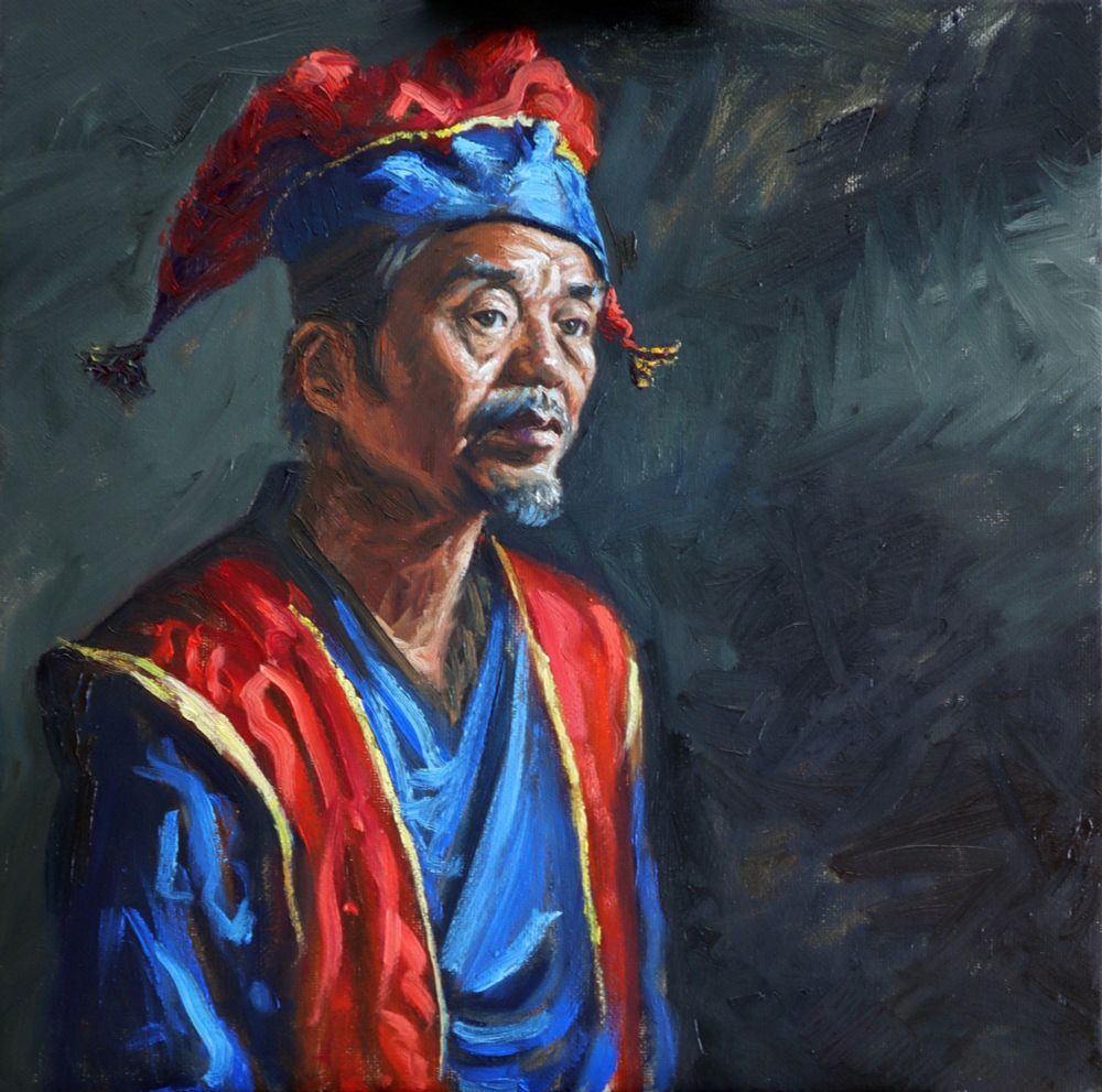 A few years ago in Malaysia, I crossed paths with a man I’ve come to call Carmelo. He was quiet and kind, with a presence that stayed with me long after our brief exchange. I took a simple photo of him, nothing remarkable at the time.

But over the years, that image transformed in my mind. I began to imagine him as a jester: draped in worn, vibrant garments, a figure balancing joy and sorrow. His eyes, unchanged, seemed to speak volumes, full of unspoken stories and quiet wisdom.