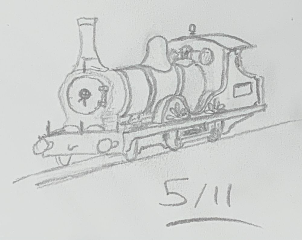 A pencil sketch of a small steam locomotive, captioned with the date May 11th.
