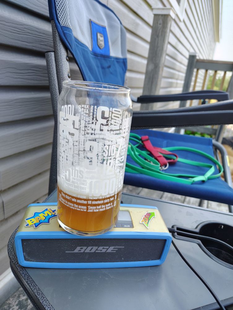 My happy place sitting on my back deck...enjoying a hand made beer, doggos  and tunes life is good!! 