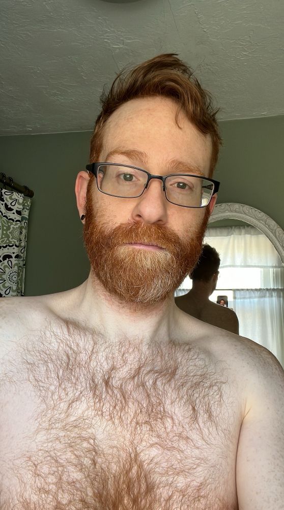 A selfie with good morning lighting and bed head. 