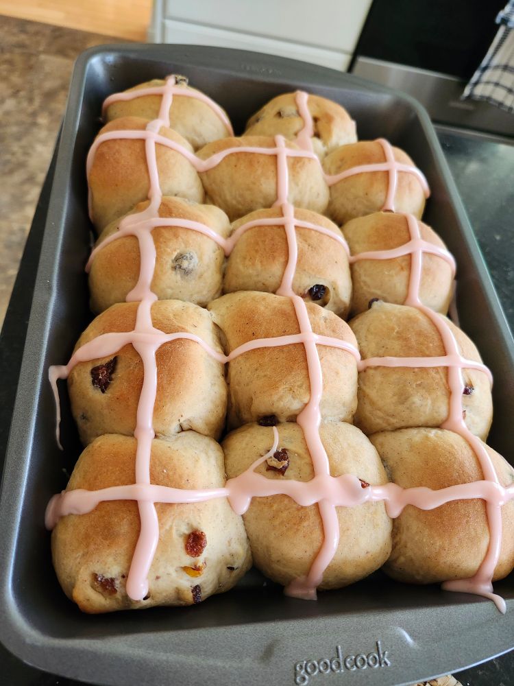 Hot Cross Buns with pink icing crosses.