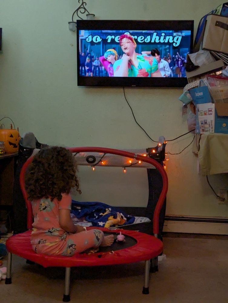 Photo of said grandkid watching Soda Pop on YouTube.