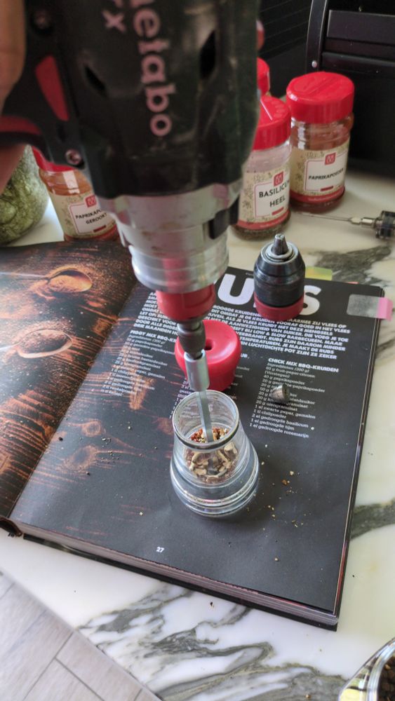 Power drill attached to pepper mill