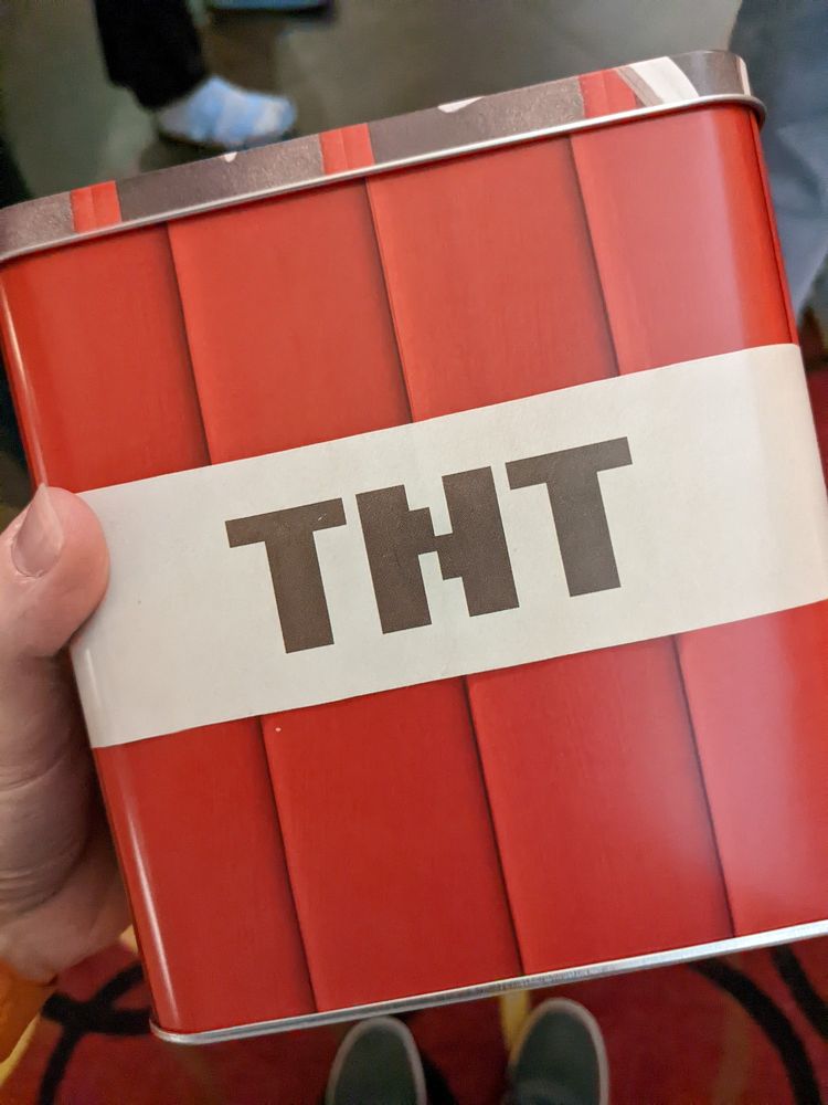 The TNT collectible A Minecraft Movie tin