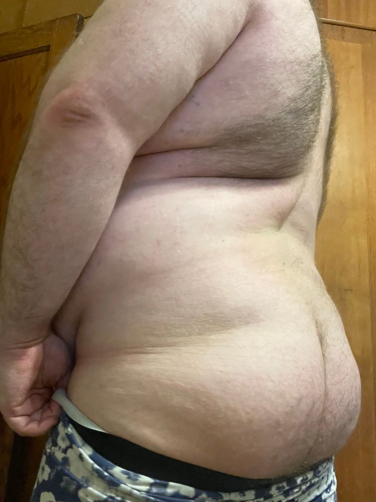 Showing my hairy back and butt. Blue and white underwear showing just below my ass