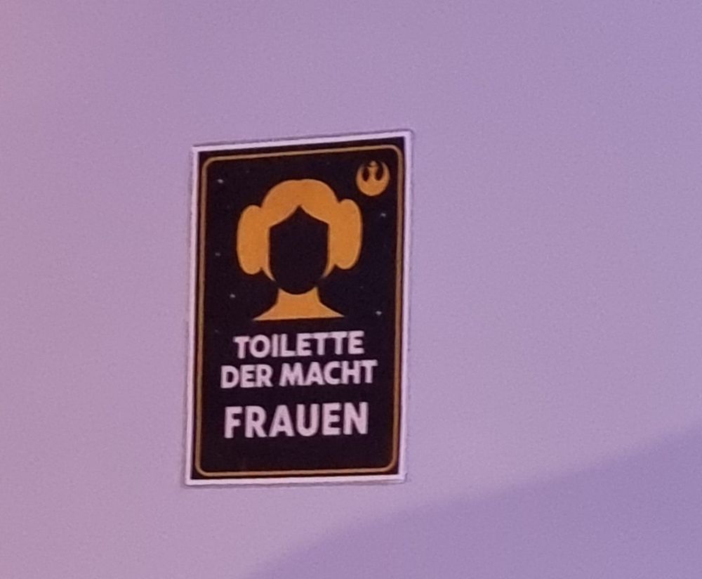 Dessin jaune de la princesse Leia pour illustrer le WC pour femmes

Toilette der Macht Frauen "Toilettes de la Force, Femmes"