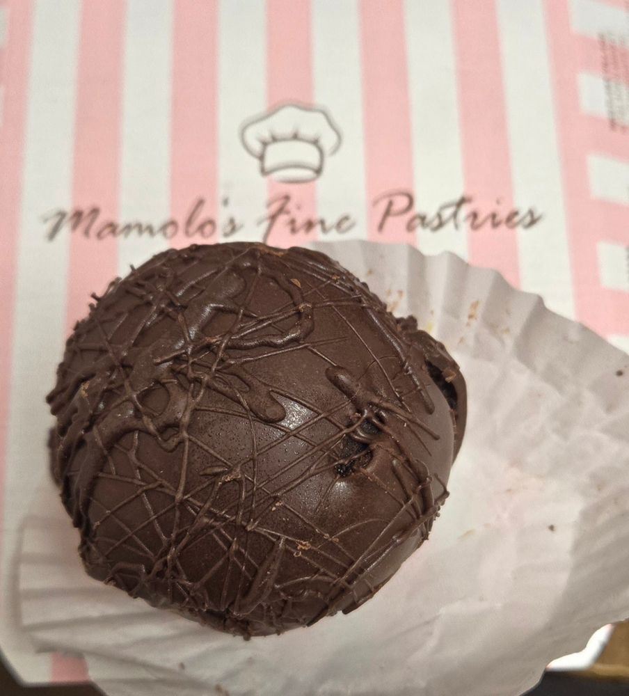 A picture of a round chocolate dessert 