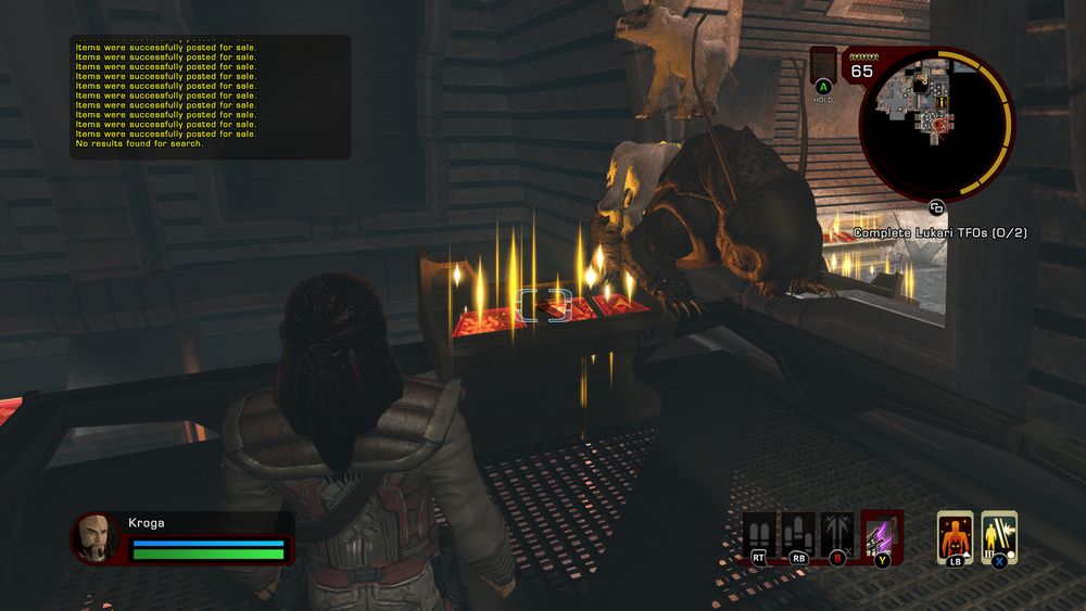 Screenshot from Star Trek Online on Xbox. Two Jackal Mastiffs stacked on top of a tardigrade on top of the Exchange console on Qo'noS.