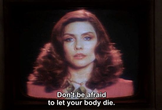 Deborah Harry saying "Don't be afraid to let your body die" on a fuzzy TV screen in David Cronenberg's "Videodrome," from 1983.