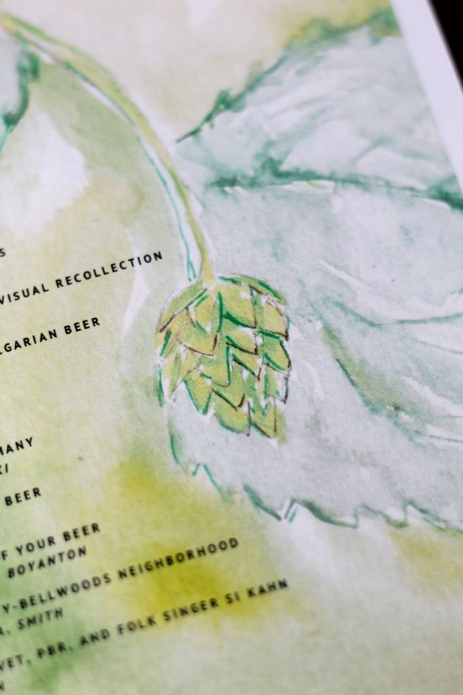 Photo of zine cover showing watercolor painting of a hop cone and leaves.