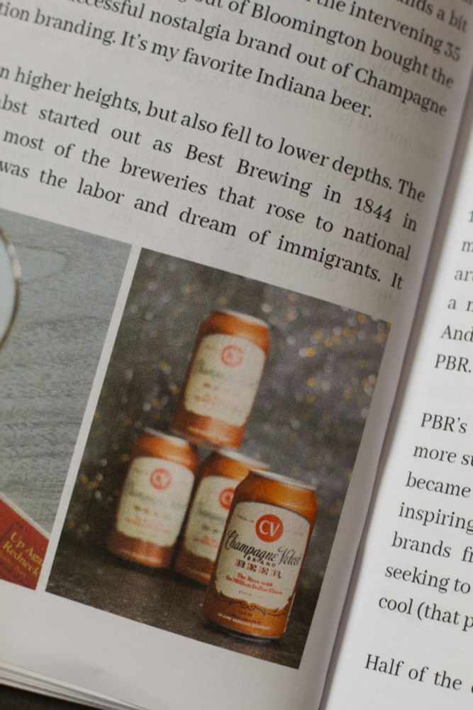 Photo of zine page showing fragments of article text and a photo of Champagne Velvet beer cans.