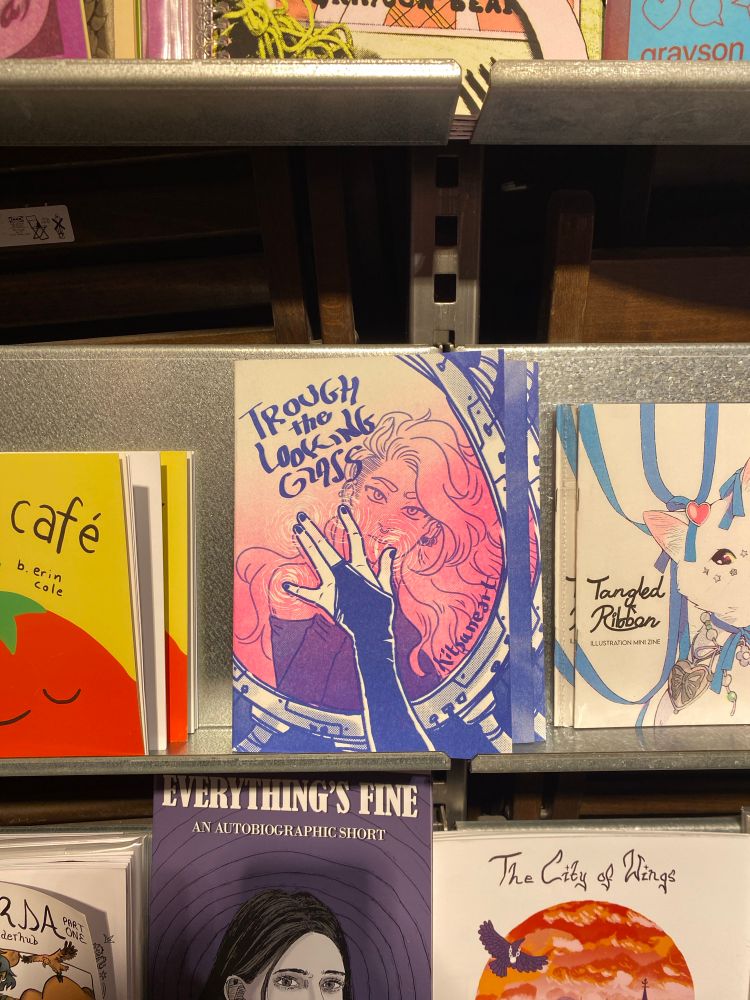 My comic Through the Looking Glass on the small press shelves at Gosh Comics, the best comic shop in Soho, London.