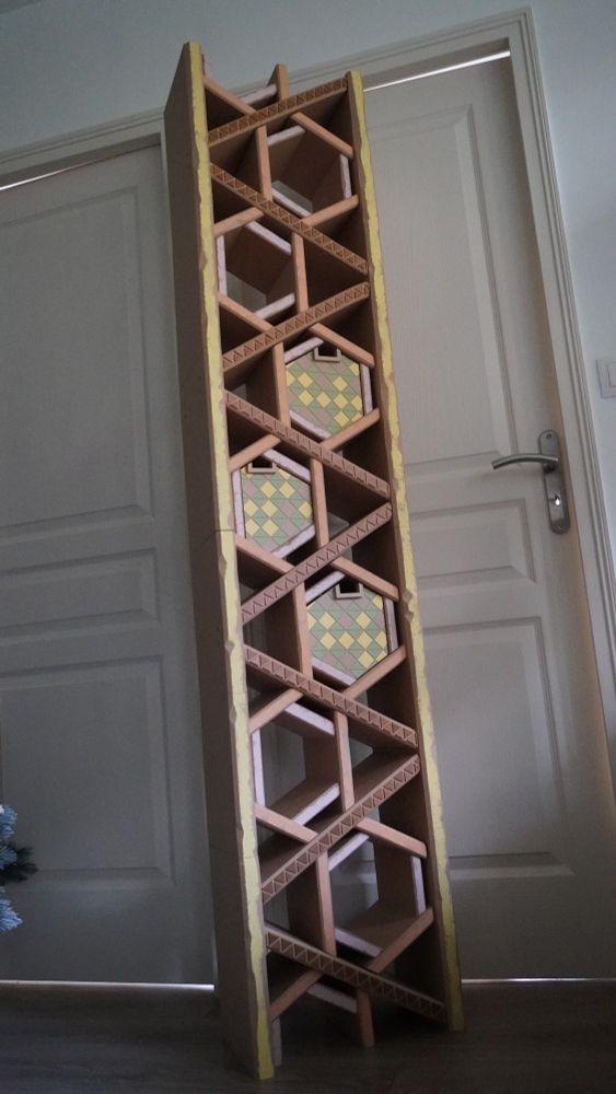 The Nomai Shelf under bright light, with no special decoration and with 3 custom made boxes for inside the hexagons