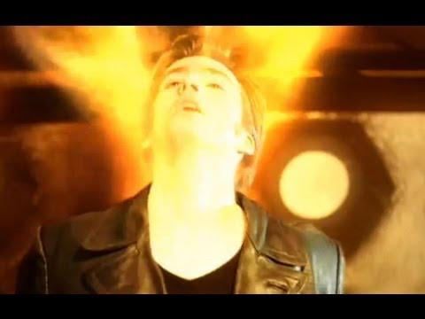 Regeneration of Christopher Eccleston into David Tennant with fiery flames coming out and around the neck