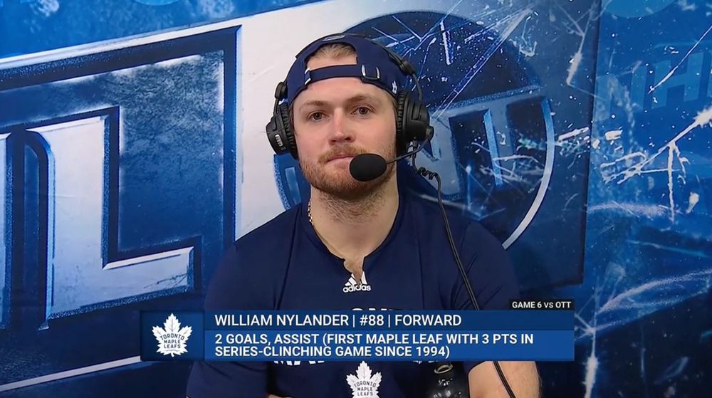William Nylander doing an interview on TBS. Chyron says "2 goals, assist (first Maple Leaf with 3 points in series-clinching game since 1994)"